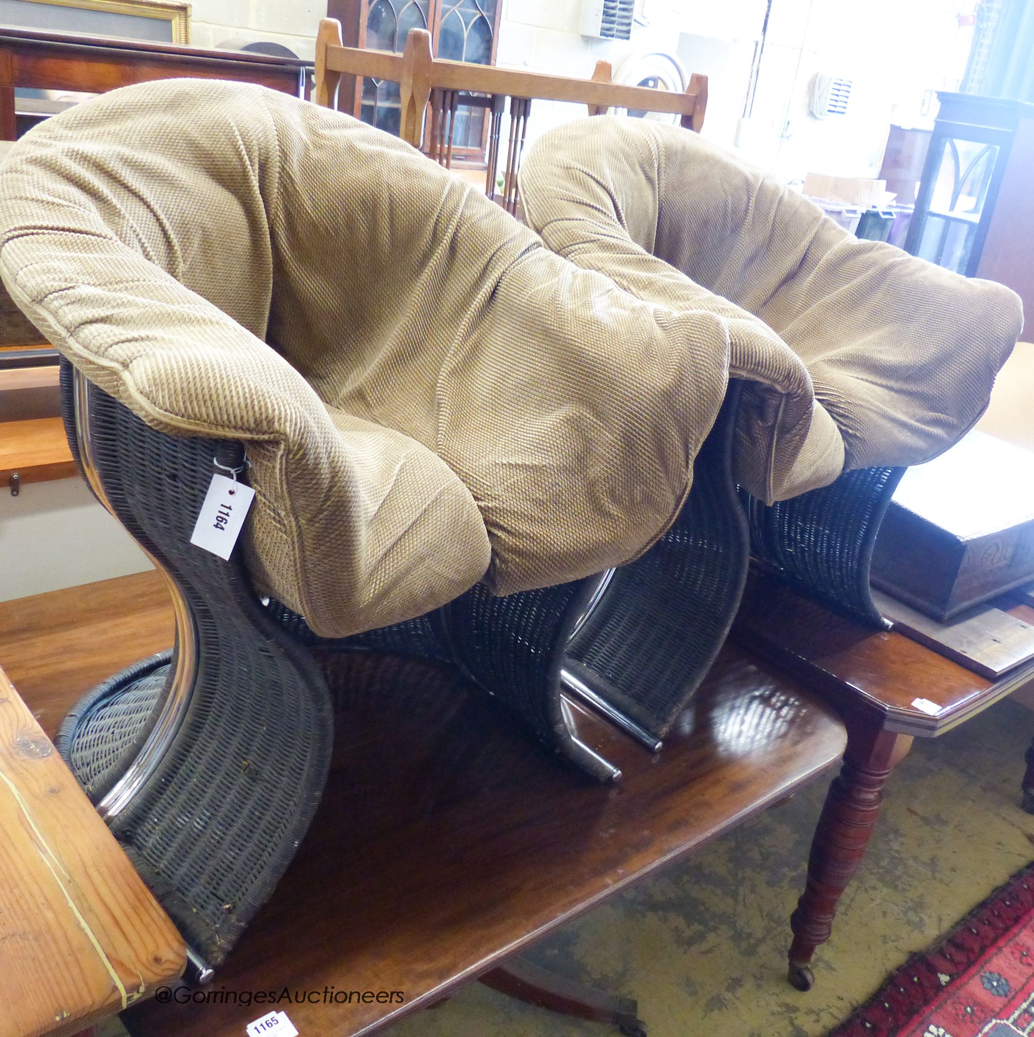 A pair of Pieff cane chairs.